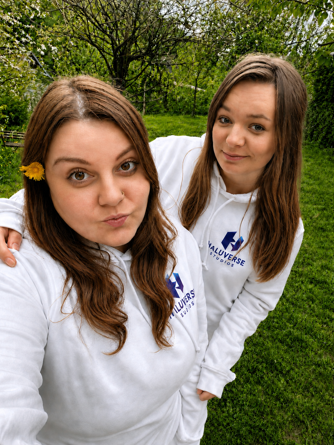 Members of the HALUVERSE STUDIOS team wearing studio hoodies